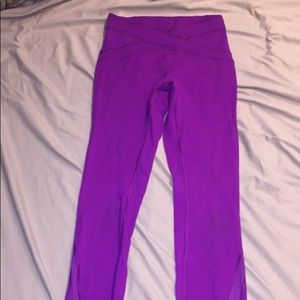 Fuchsia Lululemon leggings with mesh detail.